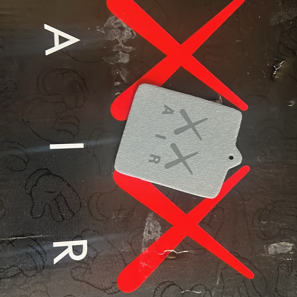 KAWS X Jordan 4 retro (gray) (size 13 with box & tag)